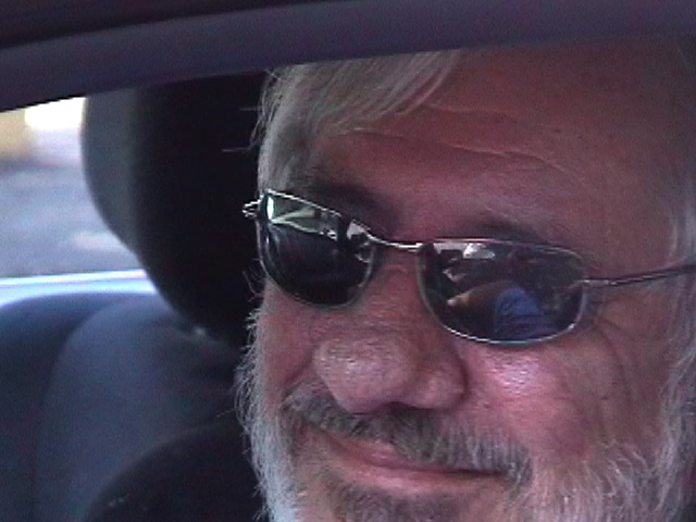 Me, sitting in Sue's car, circa 2004